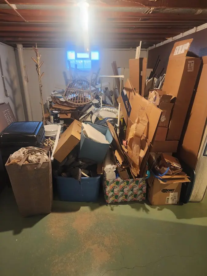 Roll-off dumpster container at job site for Construction Dumpster Rental in Coral Hills